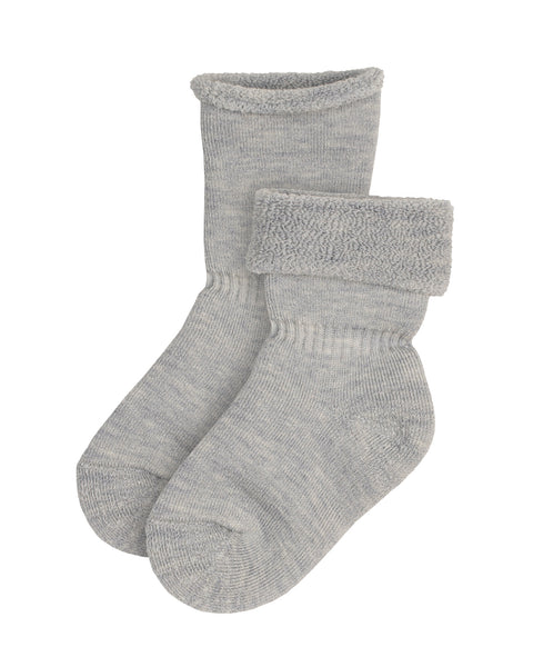 The menique KIDS' Merino Sherpa Lined Socks in light gray color, one fully rolled up, and the other rolled down, revealing the sherpa lining.