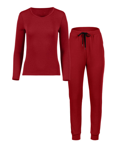 Packshot of women's long sleeve and joggers set in the color royal cherry