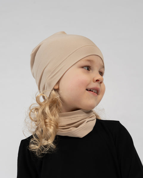 Kids bamboo beanie and neck gaiter set in beige, soft neutral accessories for all seasons.