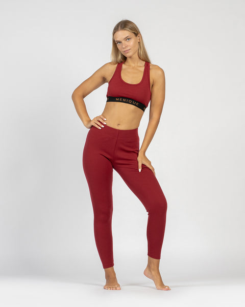 The menique women's merino wool sport bra in 160gsm and leggings in 250gsm fabric, royal cherry color.