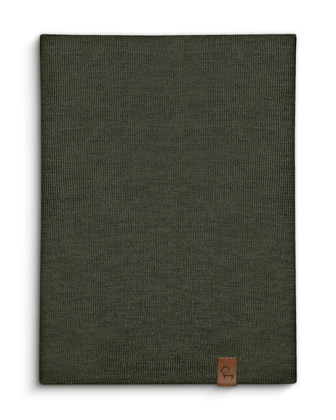 Dark green Merino wool knit neck gaiter laid flat featuring a small leather logo tag.